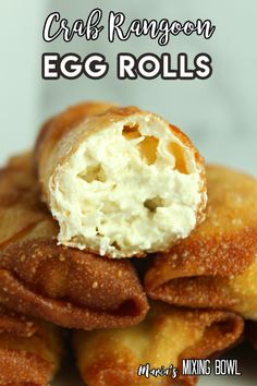 crab rangoon egg rolls are stacked on top of each other with the words, crab rangoon egg rolls so yummy