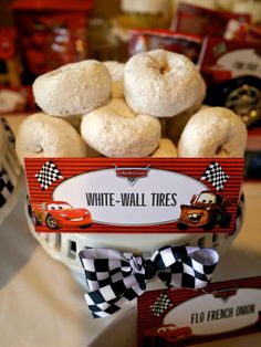 a basket filled with donuts sitting on top of a table