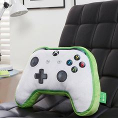 a game controller pillow sitting on top of a chair