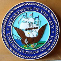 the seal of the united states of america is shown on a cardboard box with an eagle and ship