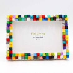 a colorful photo frame with words pin living on it