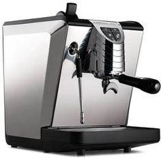 an espresso machine is shown on a white background with no image to describe