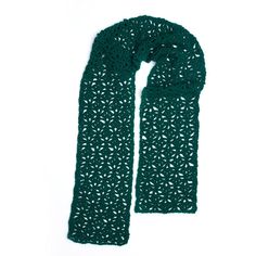 a green crocheted scarf on a white background