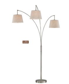 three light floor lamp with white shades on the lampshade and two beige shades on the lightshades