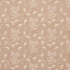 a brown and white floral pattern on fabric