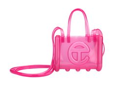 The small Melissa x Telfar Jelly Shopper — features a fluid design and tubular construction. This transparent shopper is water-resistant and concert + festival compliant, making it an instant summer staple. Molded using Melissa's exclusive Melflex materials, it looks extra bomb with the matching slides. Small is the party-bag + the afterparty too. Jelly Telfar Bag, Pink Summer Jelly Sandals, Pink Synthetic Platform Jelly Sandals, Pink Non-slip Plastic Jelly Sandals, Jelly Purse, Shopper Bags, Fluid Design, Concert Festival, Emily Ratajkowski