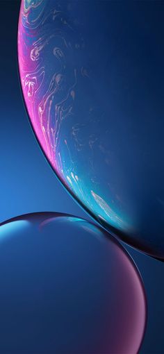 the back side of an iphone xr with blue and pink swirls on it