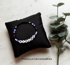 Brace yourself for high-speed fashion with the Alpine F1 bracelet. A fusion of colours and racing flair, this accessory captures the essence of the acclaimed team. Stand out from the crowd on and off the track! This bracelet is inspired by the Alpine 2024 Livery The bracelet is made of strong elastic string, small glass beads and white letter beads. Feel free to message us if you have questions or need variations. Our bracelets ship from Norway and they are sent as letters without tracking. Any Formula 1 Bracelet, Fan Bracelet, Alpine F1, Pierre Gasly, Bracelet Friendship, Bracelet Design, Letter Beads, Bracelets Handmade Beaded