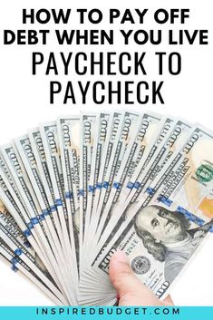 a hand holding money with the words how to pay off debt when you live paycheck