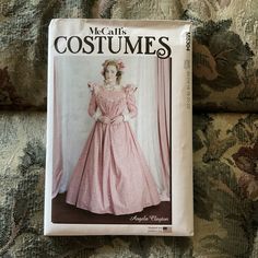 a magazine with an image of a woman in a pink dress