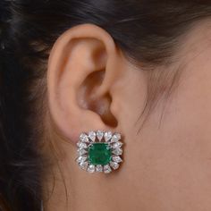 Make yourself trendy and stylish with this 18k White Gold Earrings glittering with Emerald that will add majestic charm and elegance to your look. Exquisitely designed, this Earrings will provide you a classy look. ✧✧Welcome To Our Shop Spectrum Jewels India✧✧ 18K Emerald Pear Shape Diamond Studs Earring, Natural Zambian Emerald Jewelry, Stud Earrings, Statement Earrings,  Anniversary Gift For Wife ★PRODUCT SPECIFICATION★ * ITEM CODE - SEE-15908 * METAL - 18k White Gold * 18k White Gold Weight : Pear-shaped Emerald Earrings For Wedding, Pear-shaped Emerald Earrings For Anniversary, Classic Emerald Pear-shaped Earrings, Luxury Pear-shaped Emerald Earrings, Green Emerald-cut Earrings With Diamond Accents, Diamond Earrings Design, Zambian Emerald, Anniversary Gifts For Wife, Yellow Gold Bracelet