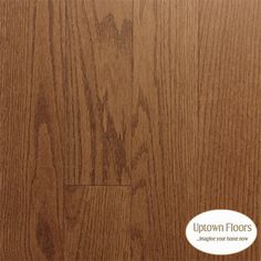 an image of wood flooring with the words up town floors written in white on it