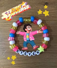 the beaded bracelet has an image of steve on it, and stars around it