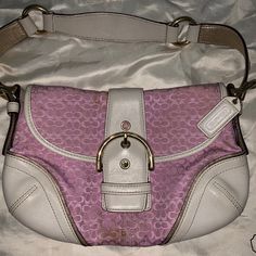 Selling Bag & Matching Wallet Signature Purse / Purple White Pink Leather Shoulder Bag This Is A Very Nice Authentic Pink & White Leather Trim Coach Purse With Gold Piping, It Has A Nice Magnetic Buckle Closure This Is A Very Pretty Pink Color. The Gold Goes All The Way Around The Edge Of The Ivory Leather Trim & Underneath The Handle. There Is A Zip Pocket Inside Also 2 Slip Pockets On The Front Wall & Another Open Pocket On The Back Wall Behind The Zip Pocket. Dust Bag Included White Coach Purse, Thrift Board, Purse Purple, Front Wall, Bags Coach, Pretty Bags, Coach Purse, Coach Purses, Pink Leather