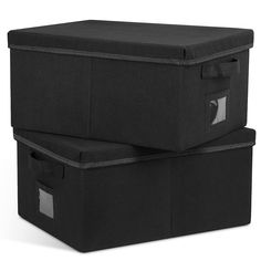 two black storage boxes sitting on top of each other