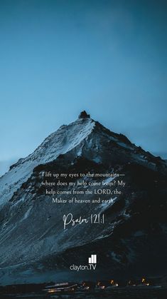 a mountain with a bible verse written on it