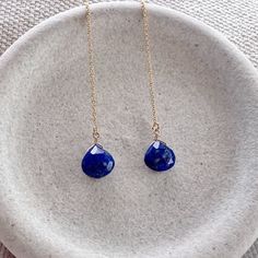 Our dainty lapis lazuli thread earrings are the perfect lightweight everyday earring. As simple as they are, the dangling sparkling semi precious lapis gemstone really makes a statement. We offer a choice of every month's birthstone as well as other popular gemstones in the drop-down menu. We also offer these earrings in gold filled, sterling silver, rose gold and 14k gold. If you need your order by a certain date, it is very important to send us a message on Etsy directly after you place your order, as well as write it in the 'Notes to Seller' at checkout.  For more information, please refer to our FAQ page. Jewelry is handmade by us in NYC focusing on quality using only the highest quality materials and handpicked genuine gemstones.   ▹ PACKAGING All jewelry is beautifully wrapped in tis Blue Long Drop Teardrop Earrings For Pierced Ears, Blue Nickel-free Linear Earrings For Gift, Blue Long Drop Teardrop Earrings, Dainty Blue Drop Earrings, Blue Teardrop Lapis Lazuli Earrings, Blue Dangle Teardrop Earrings, Blue Lapis Lazuli Teardrop Earrings, Blue Long Drop Teardrop Earrings Gift, Blue Long Drop Earrings For Gifts