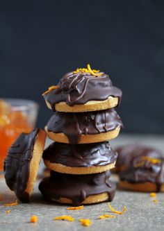 chocolate covered donuts stacked on top of each other