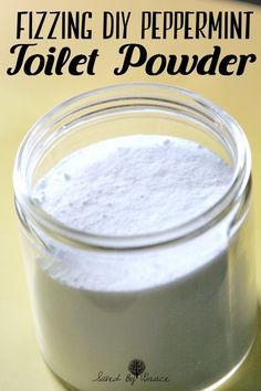 a jar filled with white powder sitting on top of a table