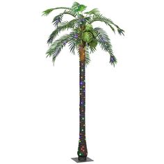 a tall palm tree with colorful lights on it's trunk and leaves in the center