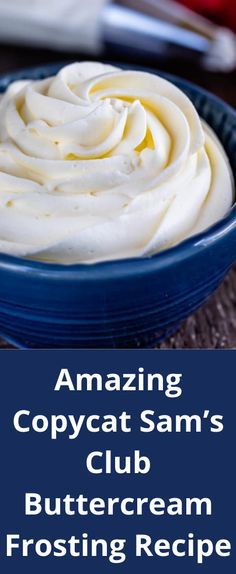 a blue bowl filled with whipped cream on top of a table