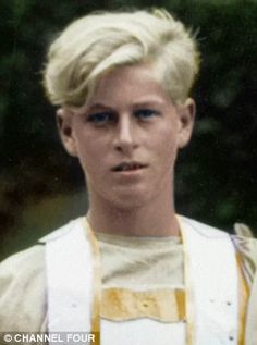 an old photo of a young man with blonde hair and blue eyes wearing overalls