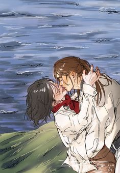 two people are kissing in front of the water