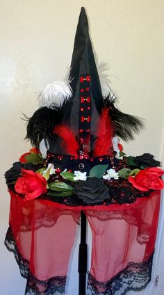 Beautiful one of a kind witch hat Jillian is classy in black red and white. Detailed in lace, sequin and rhinestones lots of gold red and black crystals. Silk rose flowers in black, white and red. Black and white ostrich feathers, has a red and black lace veil that goes all the way around.   Great for Halloween, cosplay, masquerade, wedding, bachelorette party, parade, witchcraft, Dance, just for fun.  Fits up to 24 inch Fun Fits, Halloween Witch Brooms, Masquerade Wedding, Lace Veil, Silk Rose, Lace Veils, Fancy Hats, Witch Costume, Costume Hats