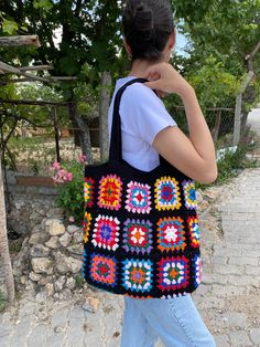 in stock! Granny square Afghan colorful bag is the perfect accessory for all your summer and winter outfits. Vivid colors of cotton are used in the crochet bag. It does not take up space in your closet, it is stylish and flashy. Bag Size Width 39 cm / 15,3 inches Height 38 cm / 14,9 inches Strap length 55 cm / 21,6 inches lined and pocketed washing information It can be washed in the hand wash program at 36F / 30C. You can lay it on a flat surface and dry it. Wish you have a good time in my shop Colorful Square Shopping Bags, Bohemian Crochet Bag With Granny Square For Shopping, Casual Square Crochet Bag For Daily Use, Trendy Square Crochet Everyday Bag, Large Capacity Multicolor Crochet Summer Bag, Bohemian Crochet Granny Square Bag For Shopping, Summer Granny Square Bags, Casual Travel Shoulder Bag With Granny Square, Casual Granny Square Beach Bag