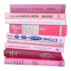 a stack of books sitting on top of each other in front of a white background