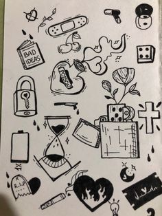 a drawing of various items on a piece of paper that is drawn in black ink