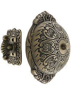 an ornately designed door handle and knob