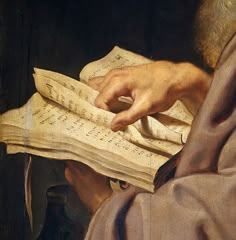 a close up of a painting of a person holding an open book with sheet music on it