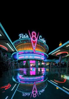 an image of a building that is lit up with neon lights and the words 8 / 8 club on it