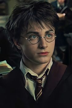 harry potter in glasses looking at the camera