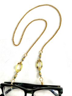 This eyeglass chain made out of vintage Italian cellulose acetate for that certain someone who-doesn't want to lose their glasses or readers, but doesn't want to look frumpy either.  It is made from a vintage moss green tortoise shell Italian acetate link with gold engraved Indian beads and agate gemstone beads. Each link on these chains is die cut and linked by hand, and then all cuts are sealed so this chain will never come apart. The ends are rubberized to be able to slide onto most eye frame Old Man Glasses, Horn Jewelry, Glasses Holder, Sunglass Holder, Gold Engraving, Cellulose Acetate