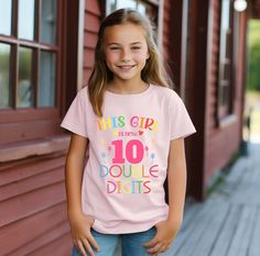 This Girl Is Now Ten Double Digits Shirt, 10th Birthday TShirt, Ten Years Old Girl Gift, Tenth Birthday Tee, 10th Birthday Girl Party Shirt ----- How To Order ----- 1-) Please, check and review all the photos. 2-) Choose your t-shirt size and color. *Different styles of shirts may have different shades of same color choice due to different manufacturer brands. *For this reason, we recommend you to match shirts from the same styles if you want precisely matching colors (ex. Unisex, V-necks, Toddl 10th Birthday Girl, Tenth Birthday, Birthday Tshirts, Birthday Tee, Matching Colors, Girl Party, Shirt Fits, 10th Birthday, Party Shirts