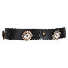 The perfect accompaniment to a breezy summer ensemble, this seashell motif belt adds a bit of bohemian whimsy to a bathing suit, pareo, kaftan or tunic. Just add sand. Wide black-brown leather belt with laser cut castellated edges; 2” diameter round seashell medallions at 7” intervals and ½” brass snap heads at 6 ½” intervals down length of belt; snap closure. Unlined. material: leather, brass, seashells noteworthy: wipe with damp cloth repairs: none condition: very good with a few light scuffs Brown Leather Belt, Waist Belt, Bathing Suit, Leather Belt, Snap Closure, Brown Leather, Sea Shells, Black And Brown, Laser Cut