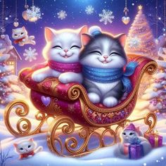 two cats sitting on top of a sleigh in the snow