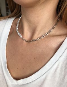 Freshwater Pearl chain necklace is handmade from the best materials. You can buy it as a gift for a friend, sister, mother. SIZE OF THE MATERIALS : The pearls are 6-7 mm (0.23 - 0.27 inch). The chain diameter is 0.5 cm (0.19 inch). NECKLACE LENGTHS: You can choose the size of the necklace. Every necklace has an extender chain. If you want CUSTOM SIZE for the necklace please write to DM. IMPORTANT INFORMATION: *Created in a pet-free and smoke-free home. * Perfect for someone with sensitive skin * Handmade Pearl Charm Necklaces, Minimalist Pearl Chain Necklace For Layering, Trendy Silver Pearl Necklace With Adjustable Chain, Delicate Silver Chain Necklace With Pearl Charm, Minimalist Layering Pearl Chain Necklace, Minimalist White Silver Chain Necklace, Trendy Pearl Necklace With Charm For Everyday, Trendy Everyday Pearl Necklace With Pearl Charm, Trendy Silver Pearl Chain Necklace