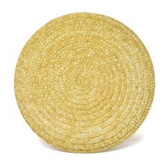 a round yellow placemat on a white background with the center circle made out of woven material