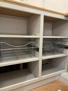 the shelves have baskets in them and are not open or closed to reveal anything else