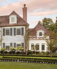 a large white house with lots of windows