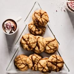 some cookies are sitting on a glass tray