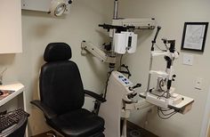 a dentist chair in the corner of a room