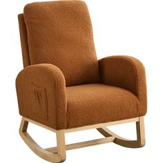 a wooden rocking chair with brown upholstered fabric