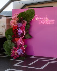 a pink sign that says agnes's potty with flowers on the front and side