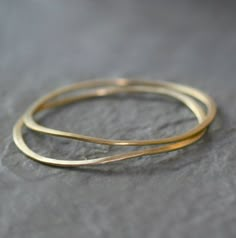 Please read my shop announcement for delivery time. If you need it by a specific date, please contact me first. Thank you!Gift packaging as well as a gift note is available at checkout. If you want to include a note, add your message in the note box during checkout.The price is for ONE bangle only.  Flat wavy bangle in brass, approx. 1/8" wide. The bangle has an organic feel and look great stacked. Also offered in sterling silver in a separate listing. Approx. interior diameter is 2.4".If you ha Layer Bracelets, Brass Bangle, The Bangles, Crescent Moon Necklace, Note Box, Jewelry Inspo, Gold Bangles, Your Message, Gift Packaging