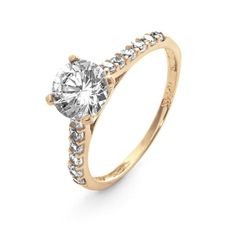 This 14k gold round cubic zirconia engagement ring makes a simple yet elegant statement. The 6mm brilliant cut stone sits 1/4 inch high on a delicate solid 14 karat real gold setting. The center is accented on either side by six sparkling 2mm stones. Wear it on your wedding day  and no one will even notice the difference! It's a beautiful alternative fake diamond ring.        Details: • 14k Gold Round CZ Ring • Cubic Zirconias ��• 1.2 Total Carats Brilliant Cut Engagement Ring, Chanel Jewelry Necklace, Brilliant Cut Engagement Rings, Boho Jewelry Diy, Necklaces For Mom, Coordinates Jewelry, Jewellery Photography Inspiration, Jewelry For Kids, Modern Jewellery Design