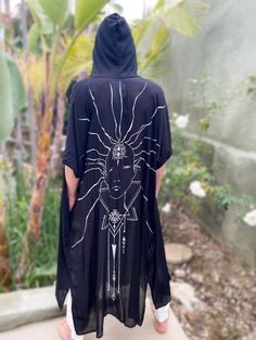 Black Wearable Art Hooded Kimono designed by 3 Soul Sisters... We are so happy to introduce the new kimonos design we have co-created with our soul sisters Svetlana of FLO Art and Violetta of The Next Level People. NOTE: PLEASE note as of now the shipping is 2 weeks. Thank you! Connecting the magic of Bali and the beauty of California we have designed these beautiful hooded kimonos, transforming the gorgeous art sketch The Wandering Monk into a print and giving Him a new dharma and a new path to Resort Loungewear, Hooded Kimono, Spiritual Design, White Yoga Pants, Samurai Pants, Cape With Hood, Yoga Pants Men, Spiritual Clothing, Cotton Harem Pants